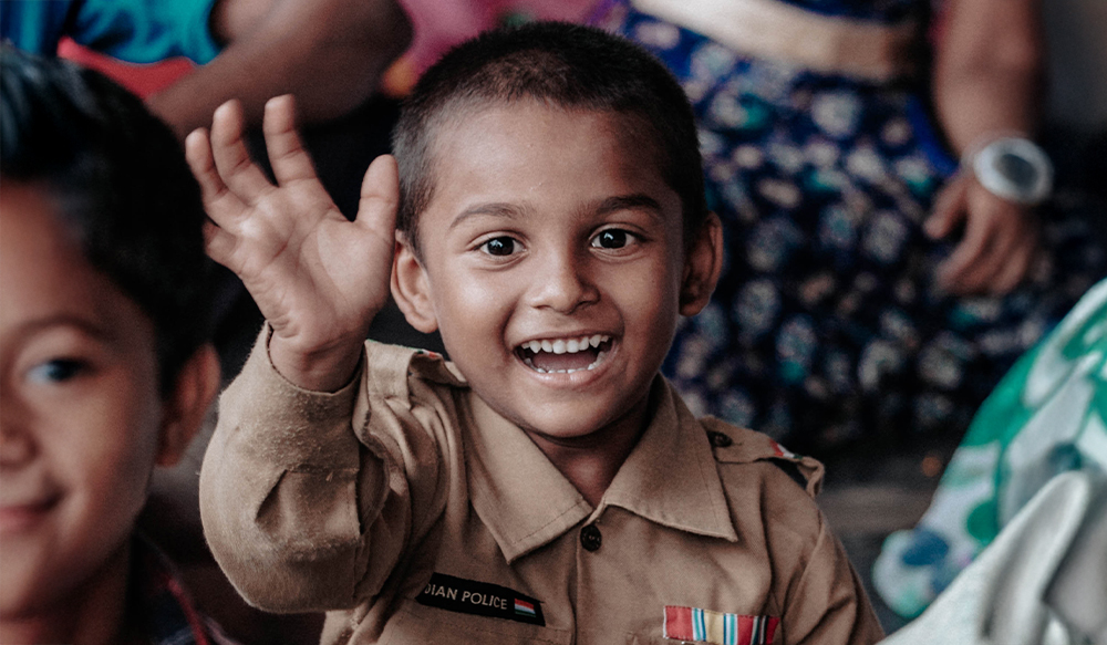 Indian orphaned boy smiling