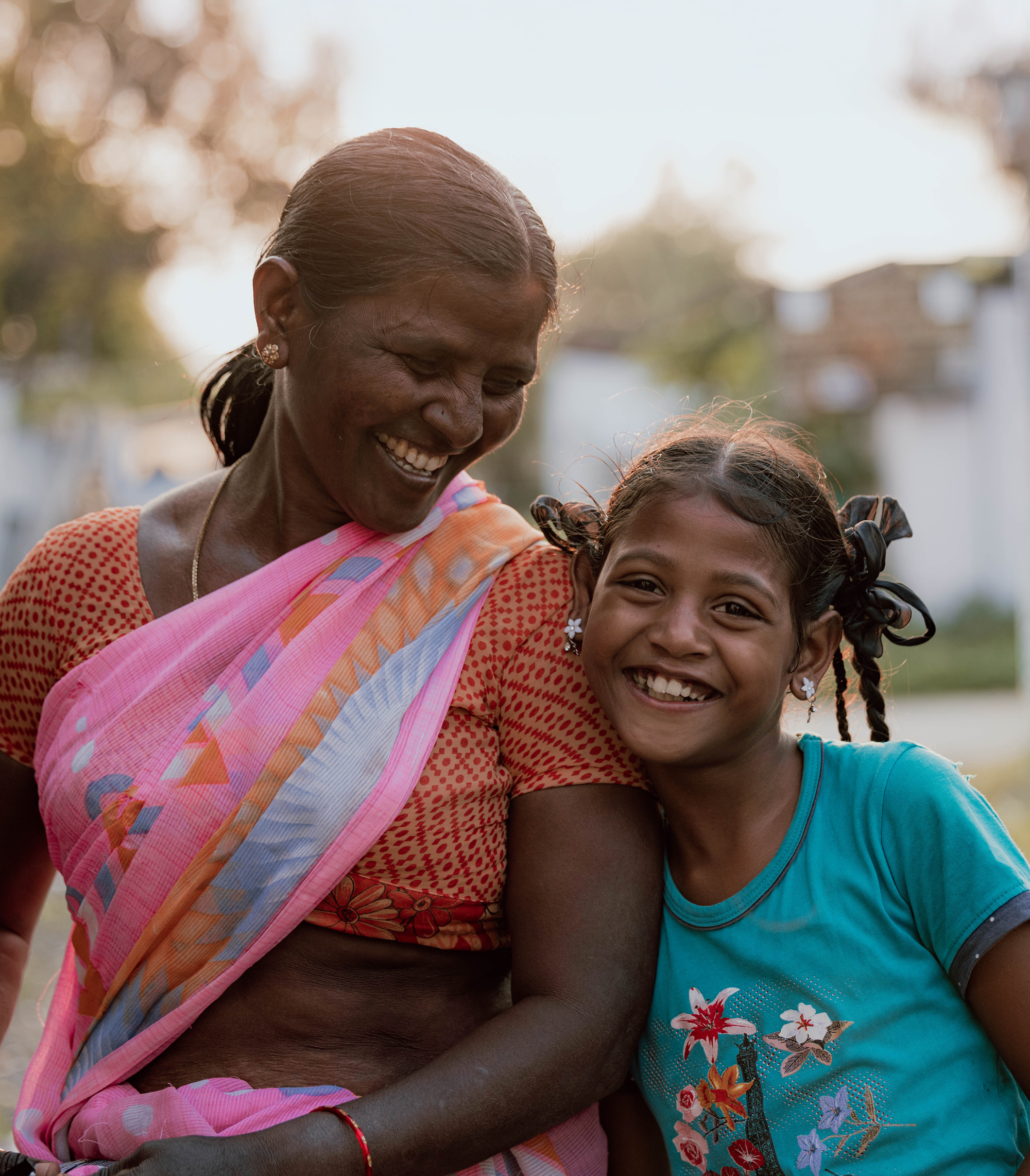 Indian woman and child smiling