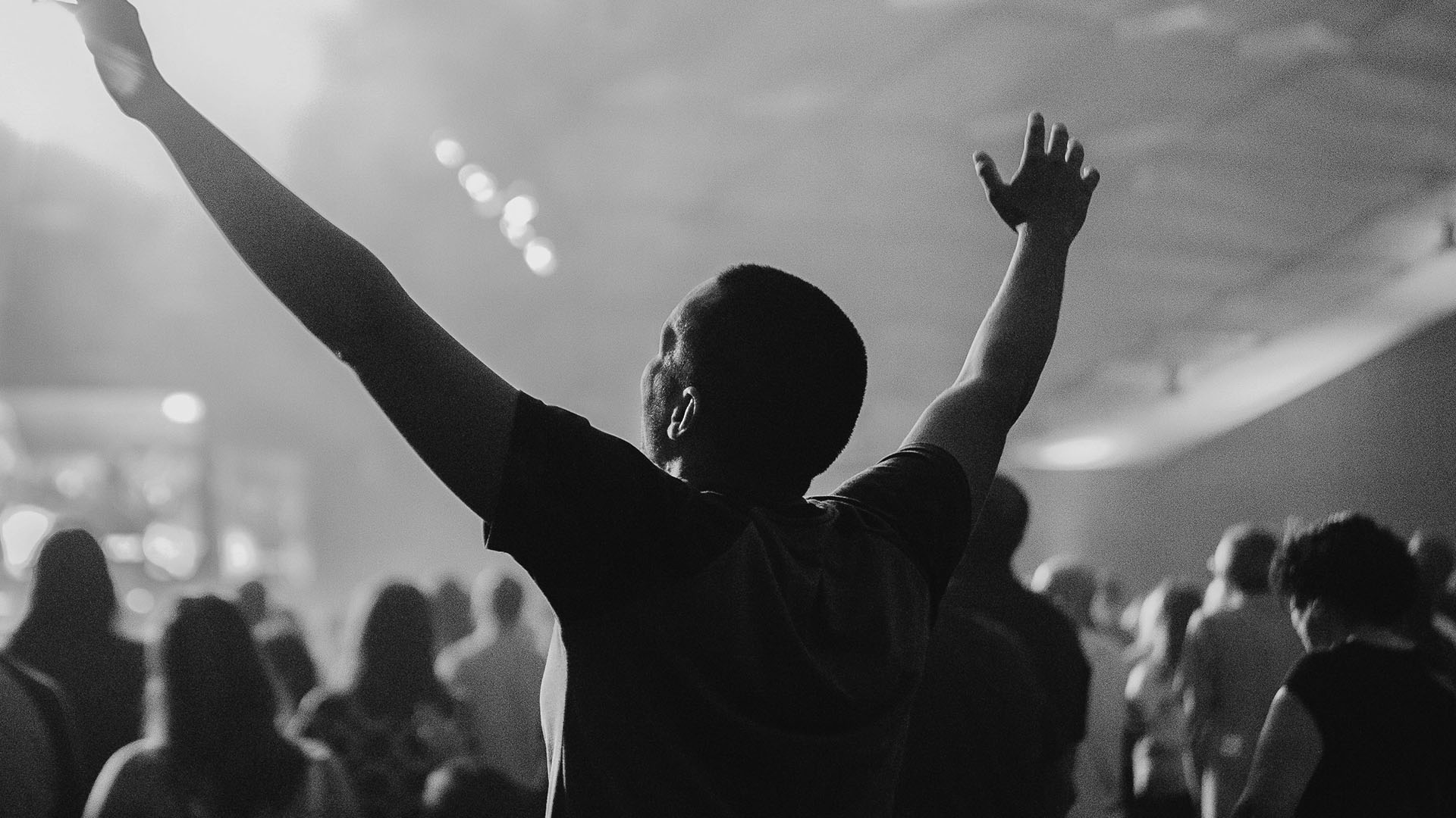 Man raising his hands in worship