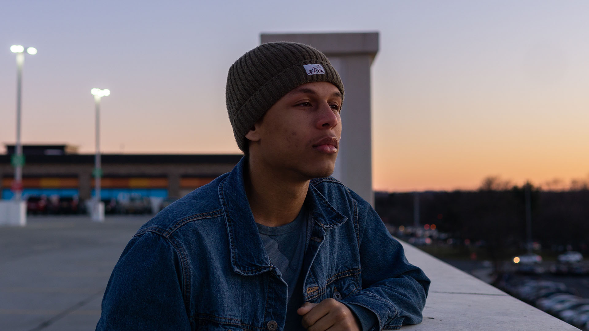 Young man looking toward the sunset