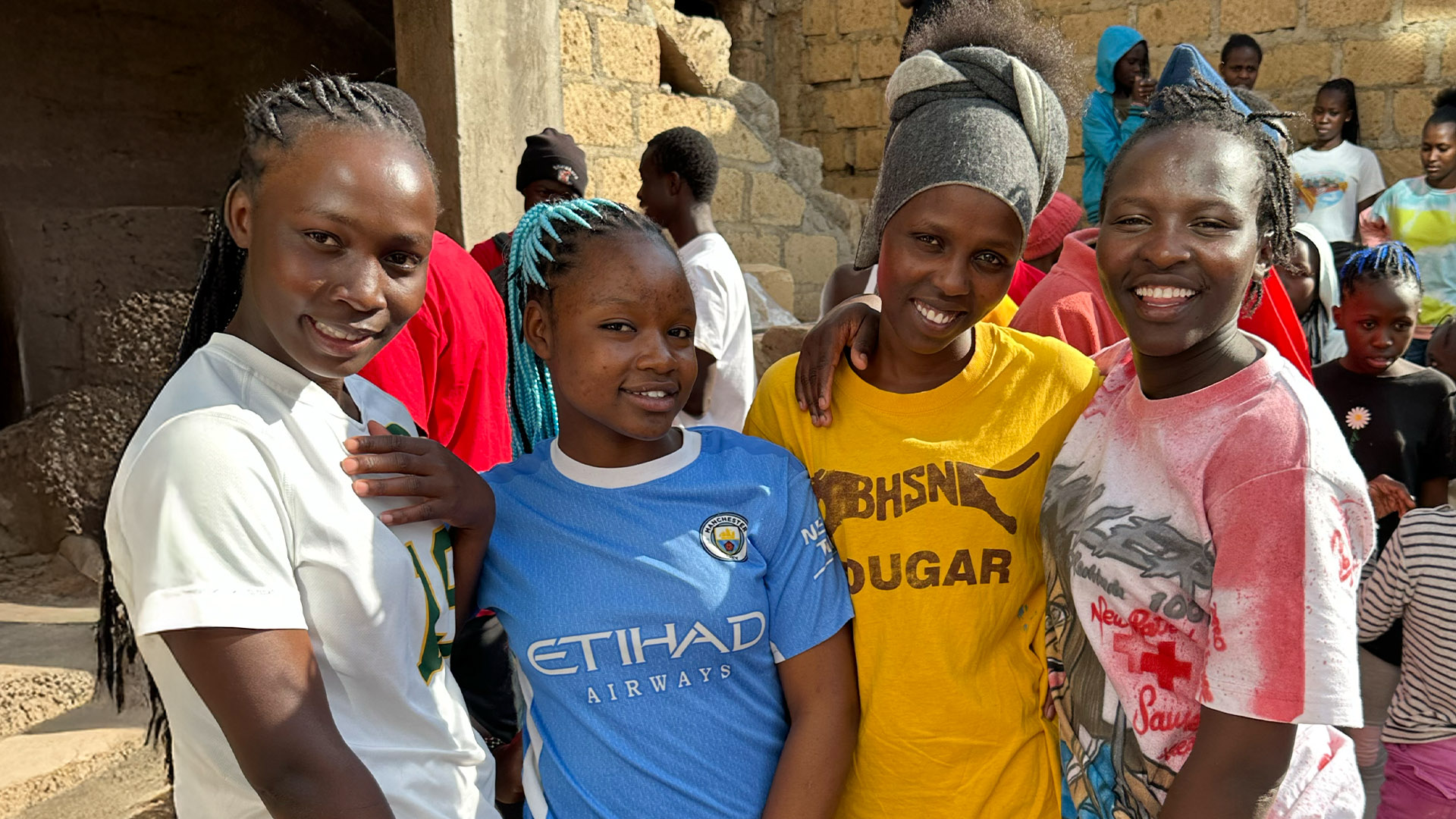 Asilia, far right, is completing her studies and is eager to begin helping girls facing forced child marriage.
