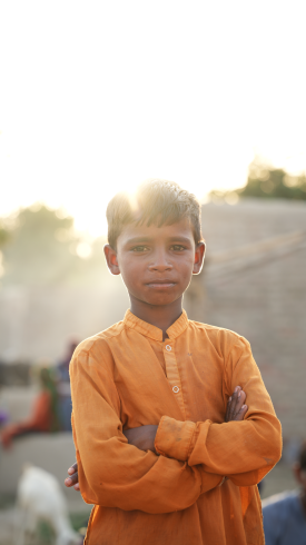 Boy with hands folded