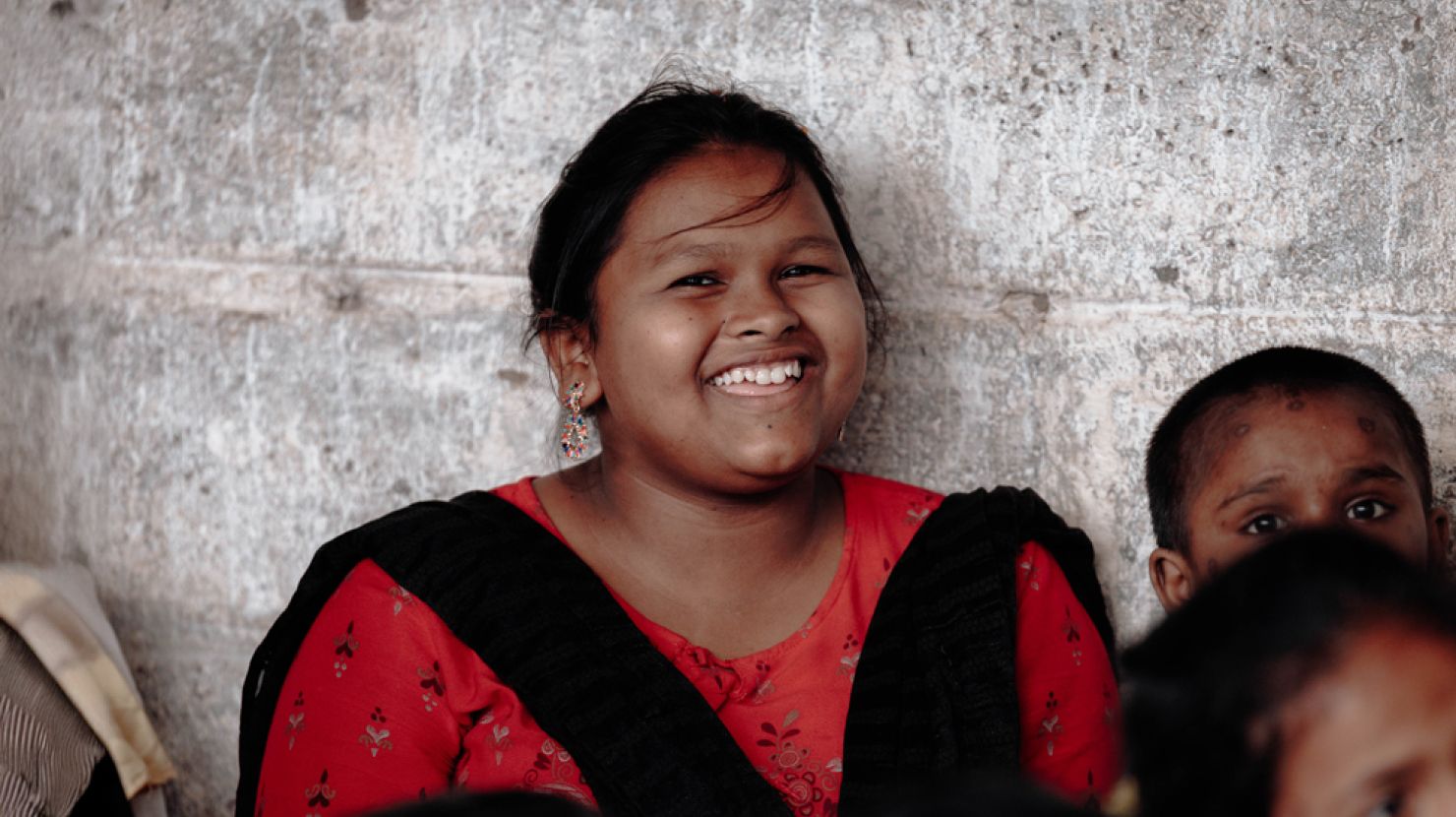 Smiling orphaned Indian girl