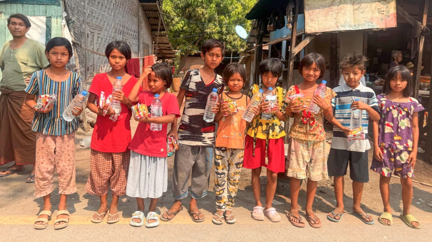 Myanmar children with water bottles