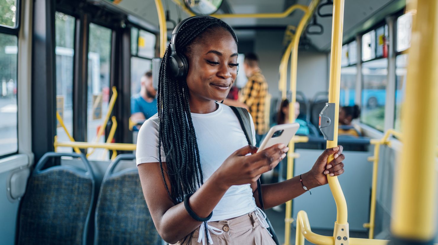 African American woman listening to music.