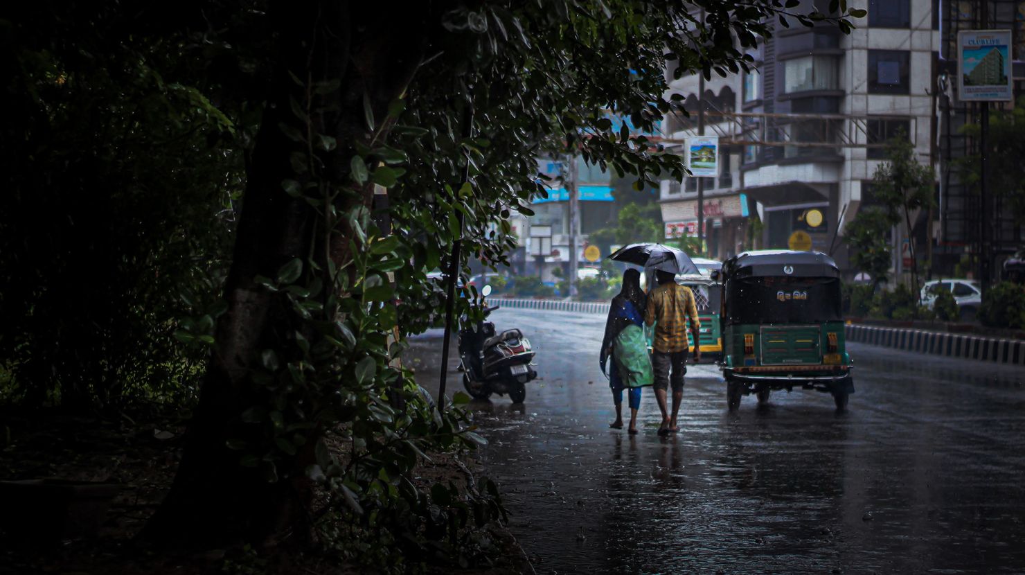 Couple walking down the street
