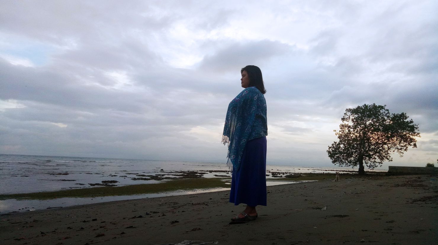 woman standing at beach