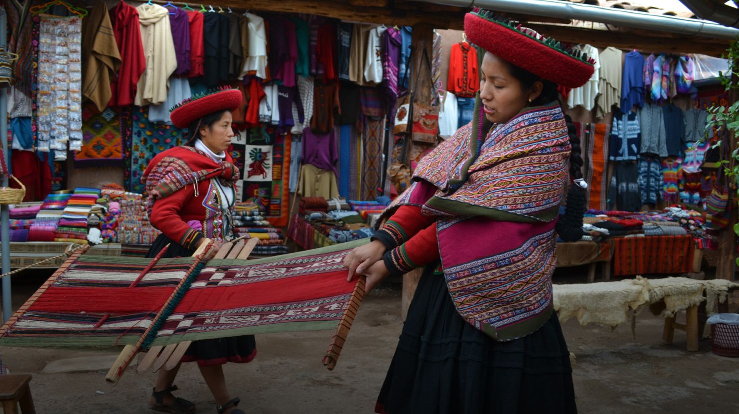 Peruvian women making fabric