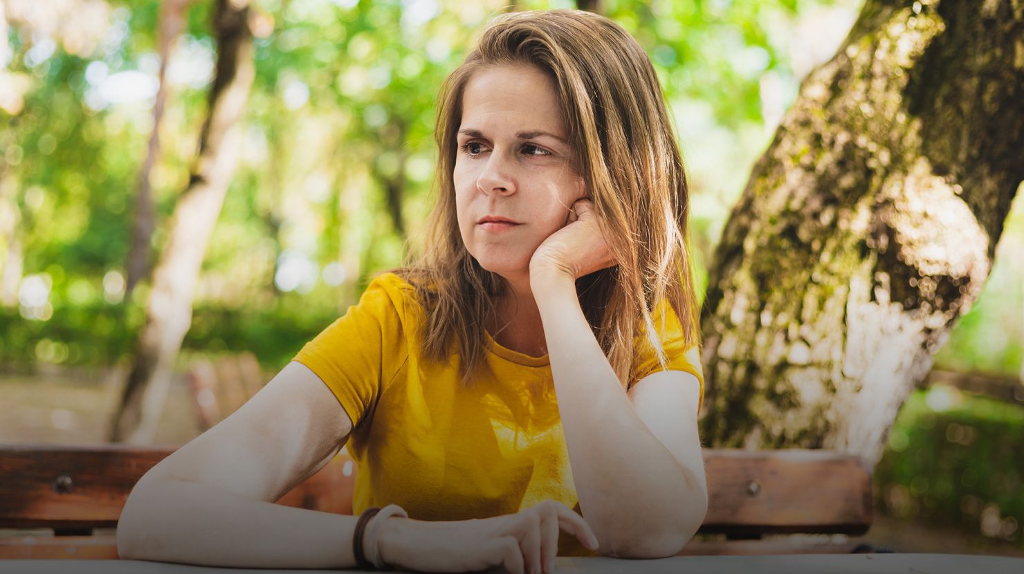 Sad woman waiting outdoors