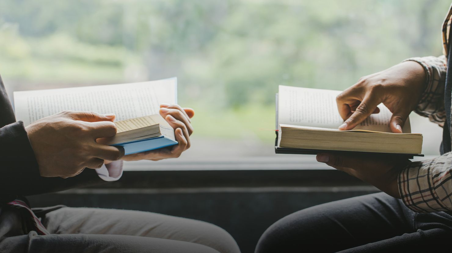 Two men studying the bible