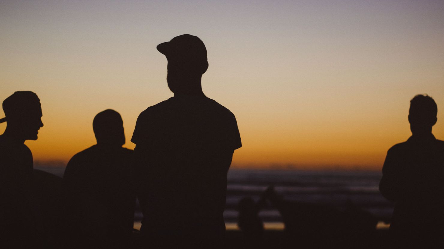 A group of friends in the sunset