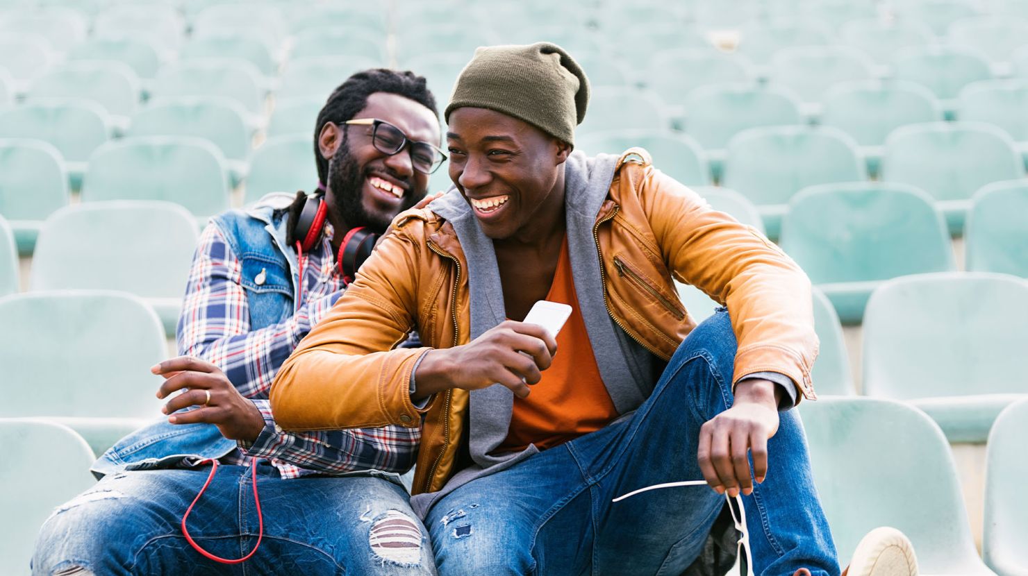 Two friends laughing together