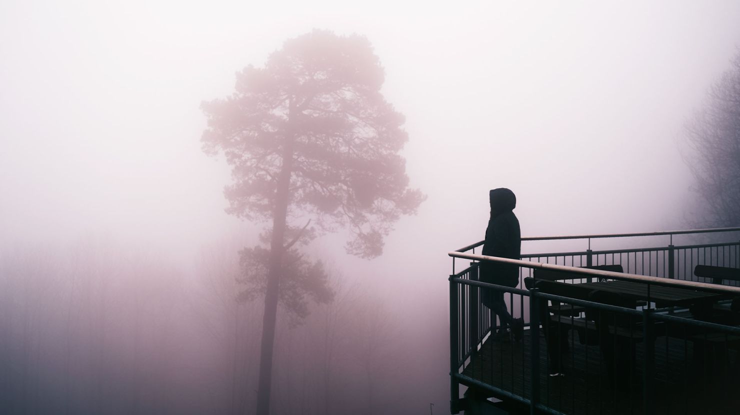 Man looking onto a hazy horizon