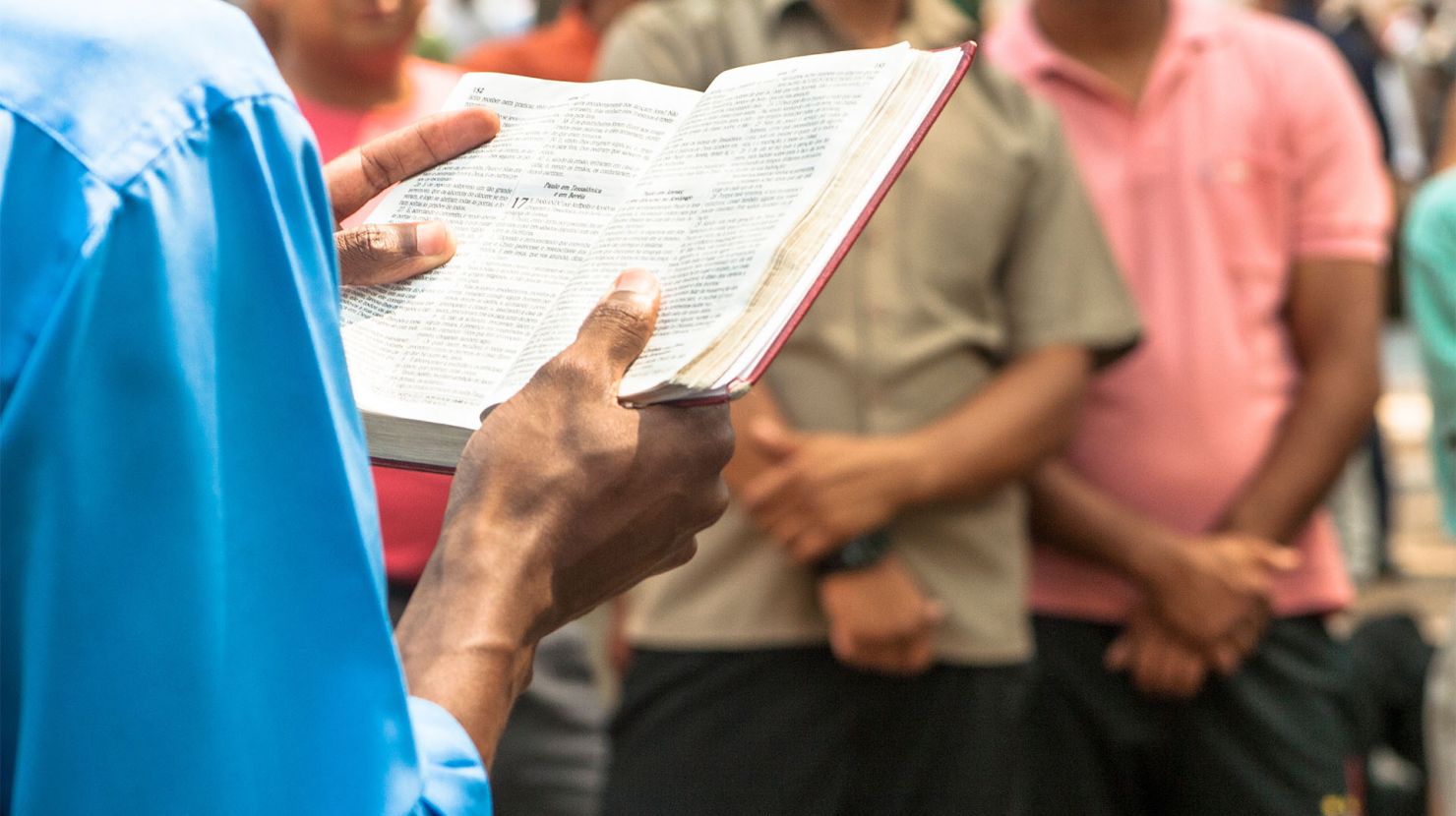 Man preaching to congregation