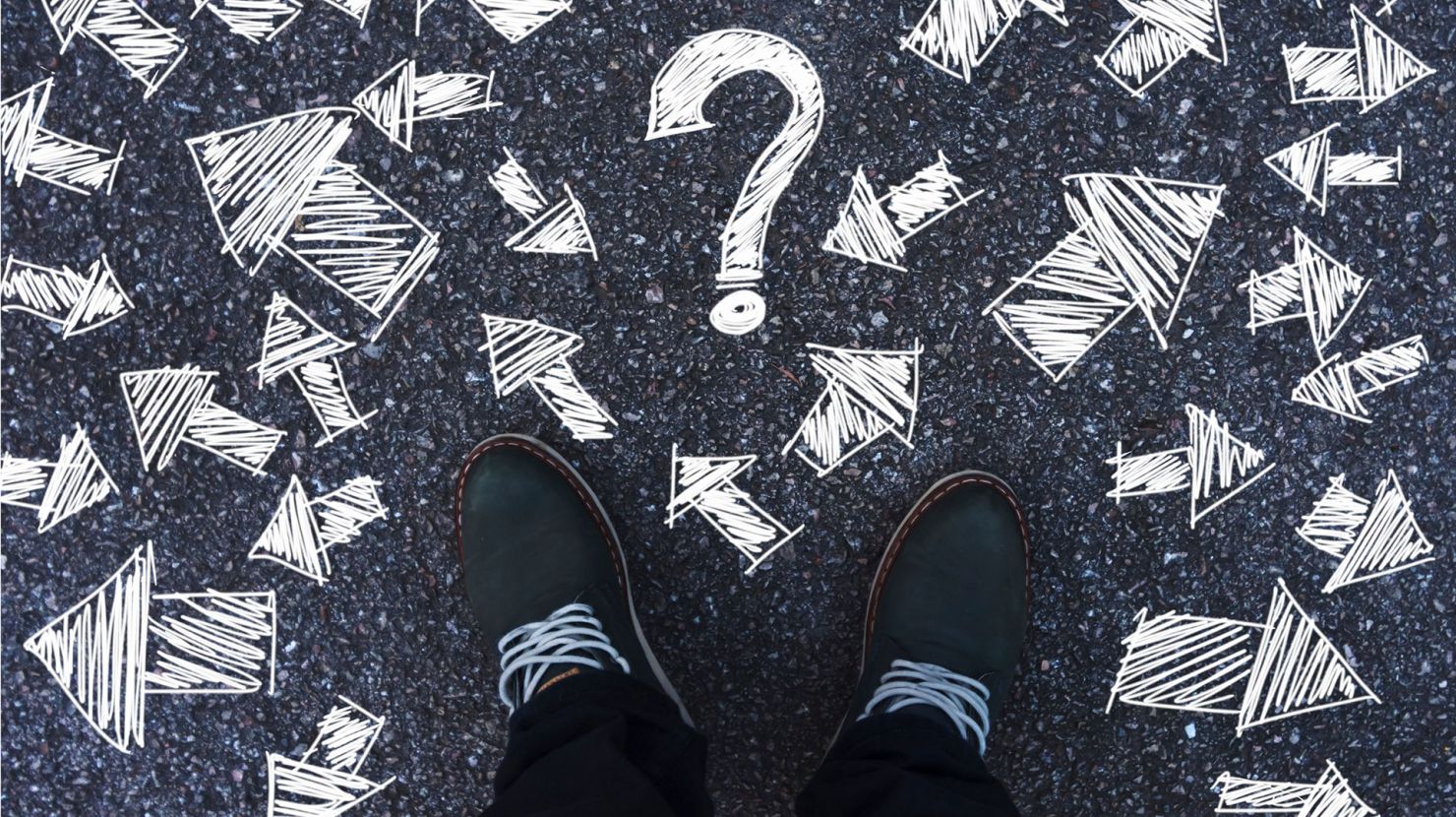 Person standing with arrows concept decisions for the future with many direction arrow choices, left, right or move forward