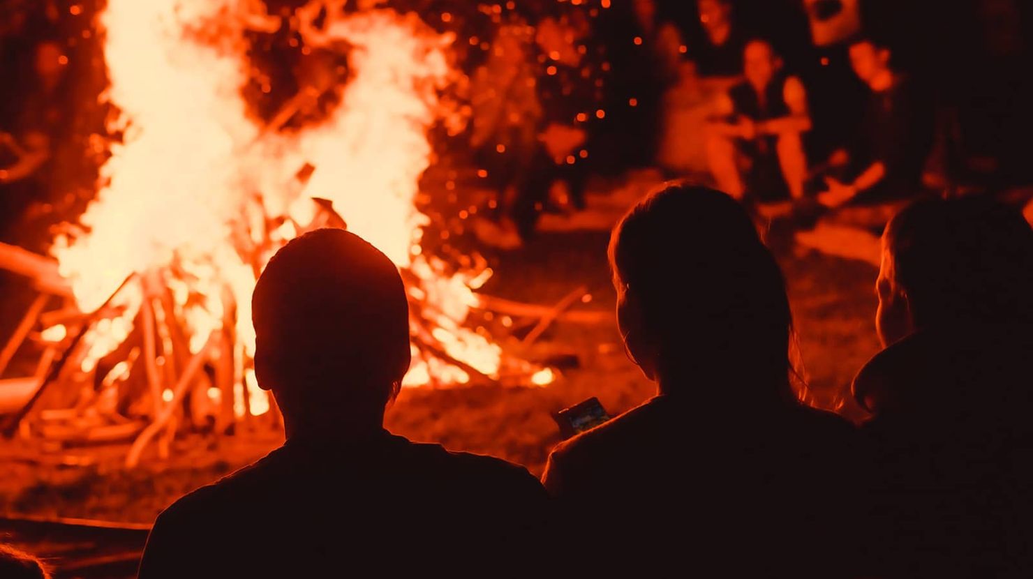 People look at bonfire