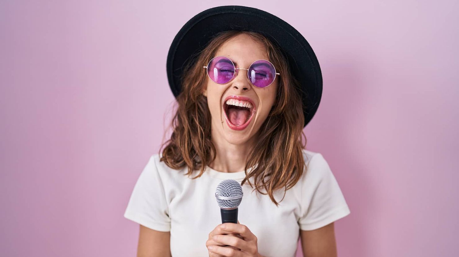 Woman shouting into mic