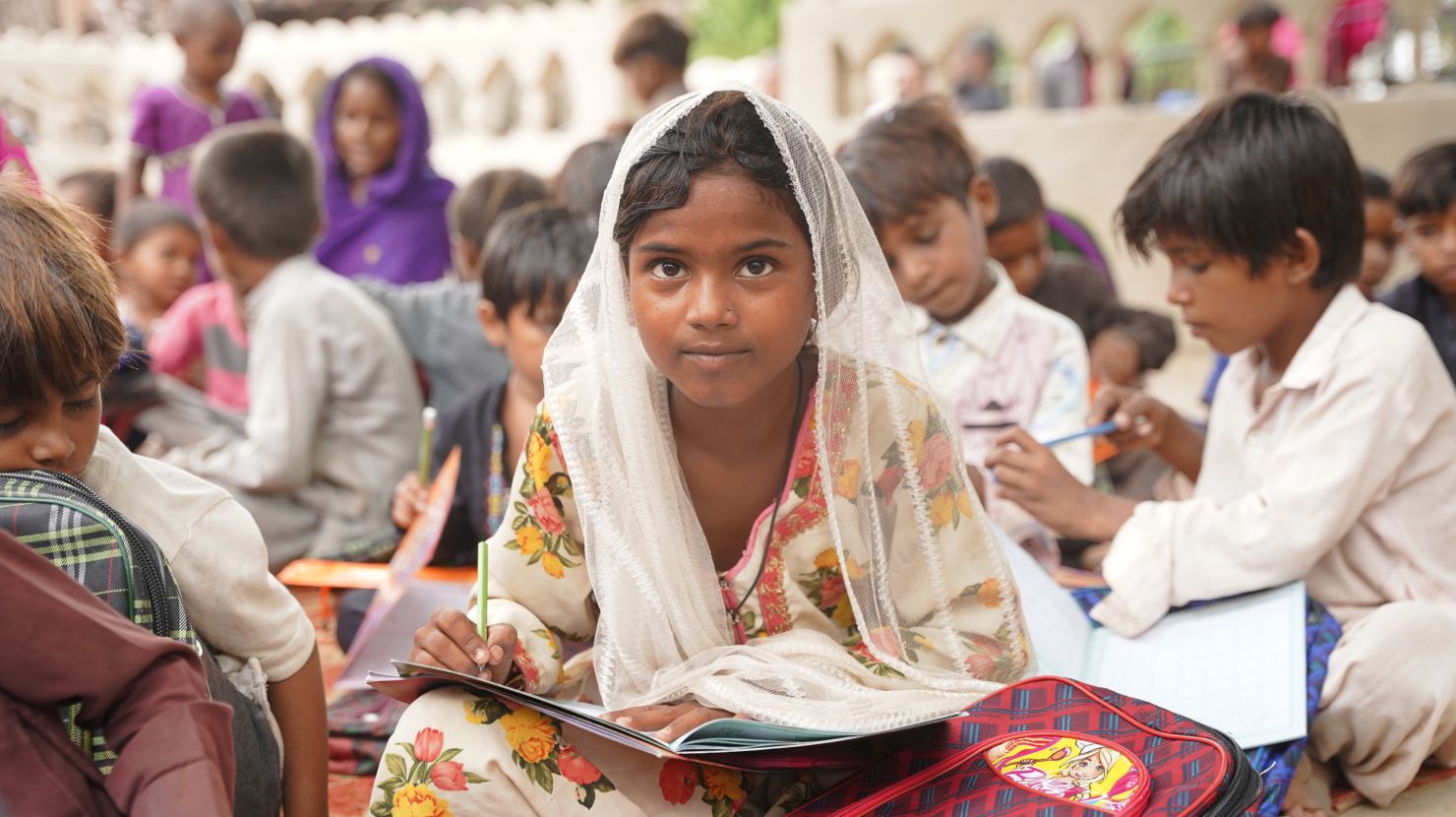 Orphaned girl smiling