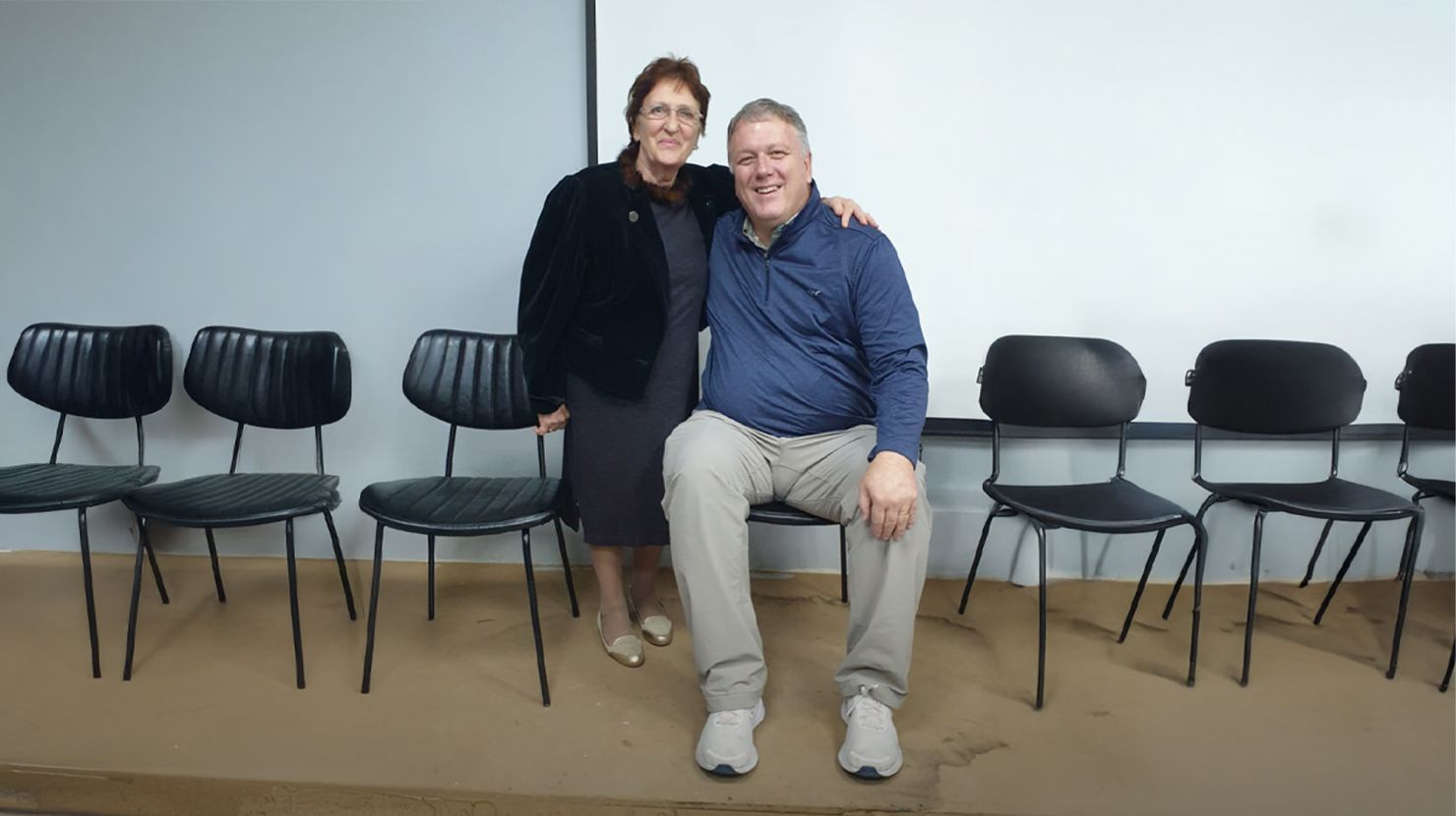Woman and man stand together