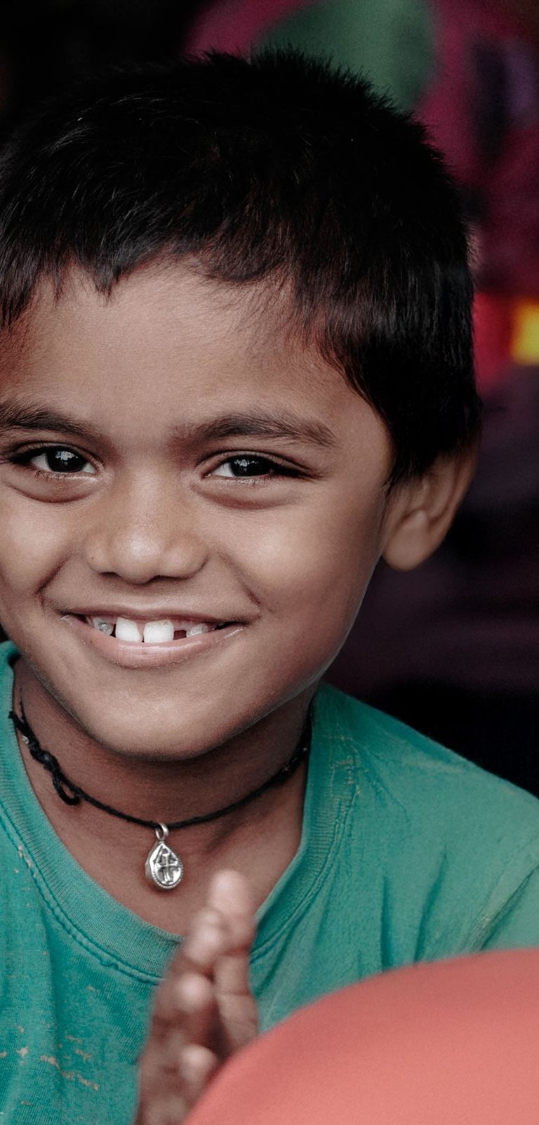 Orphan child from India smiling